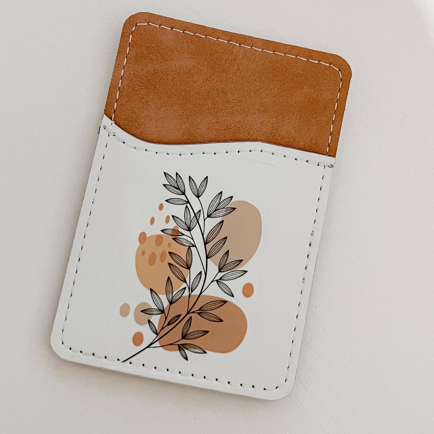 Porte-cartes en cuir à motif